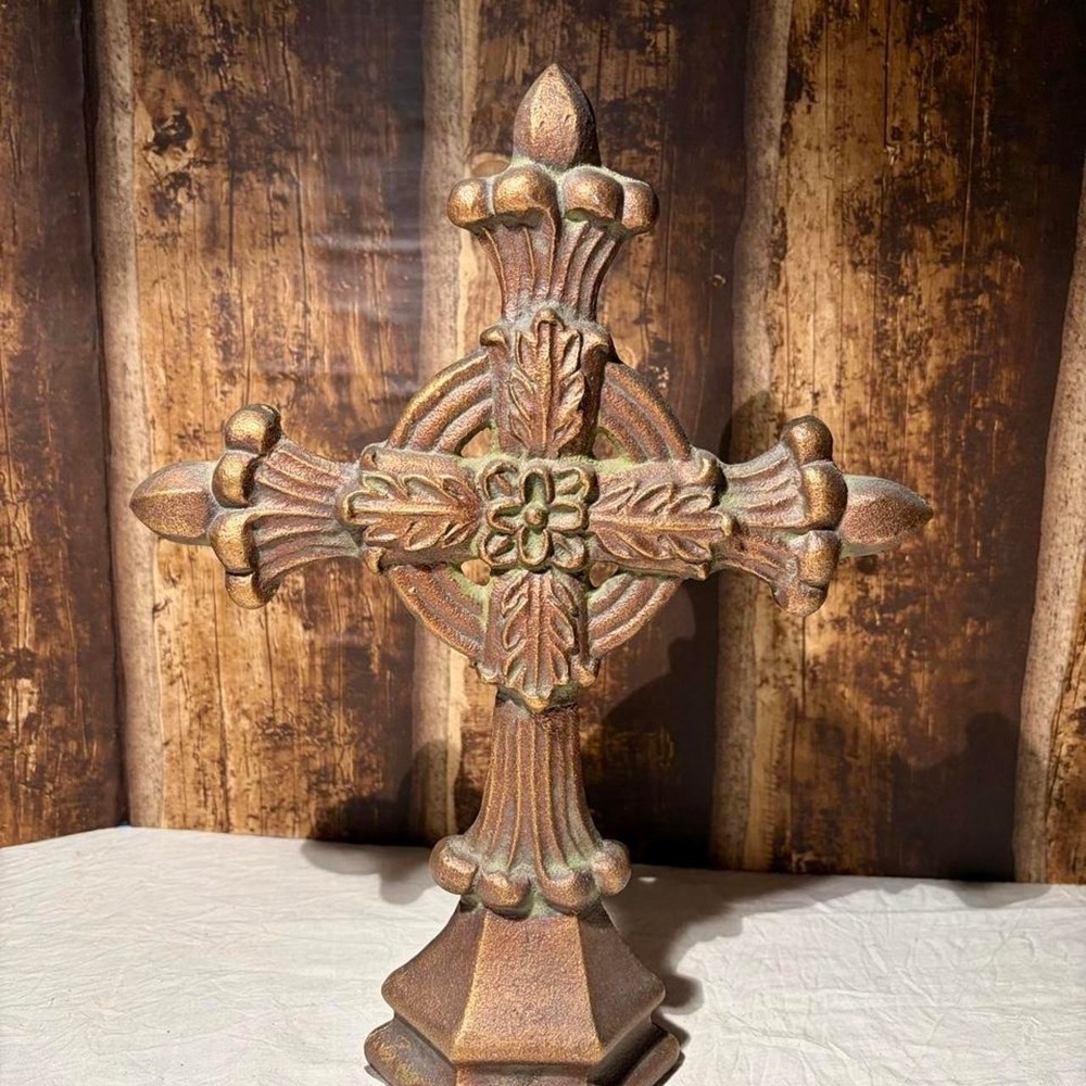 Cast iron bronze cross with ornate floral and leaf designs